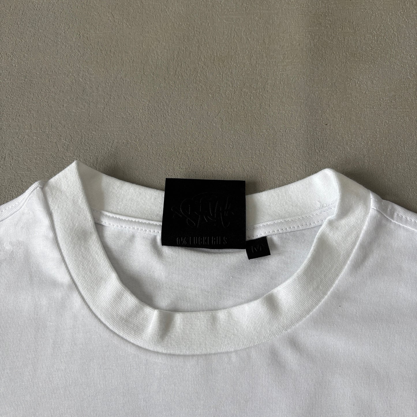 Syna World Tee