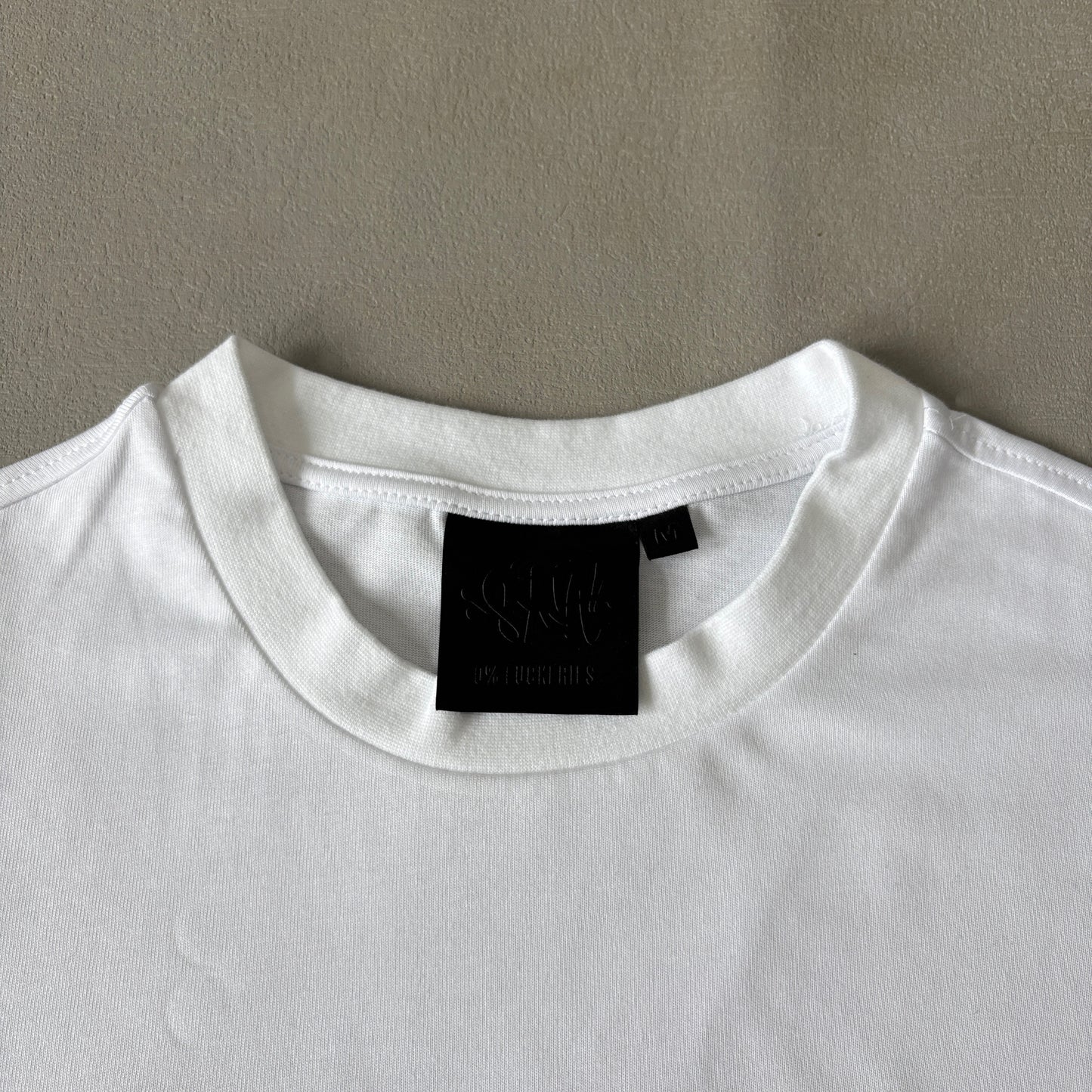 Syna World Tee