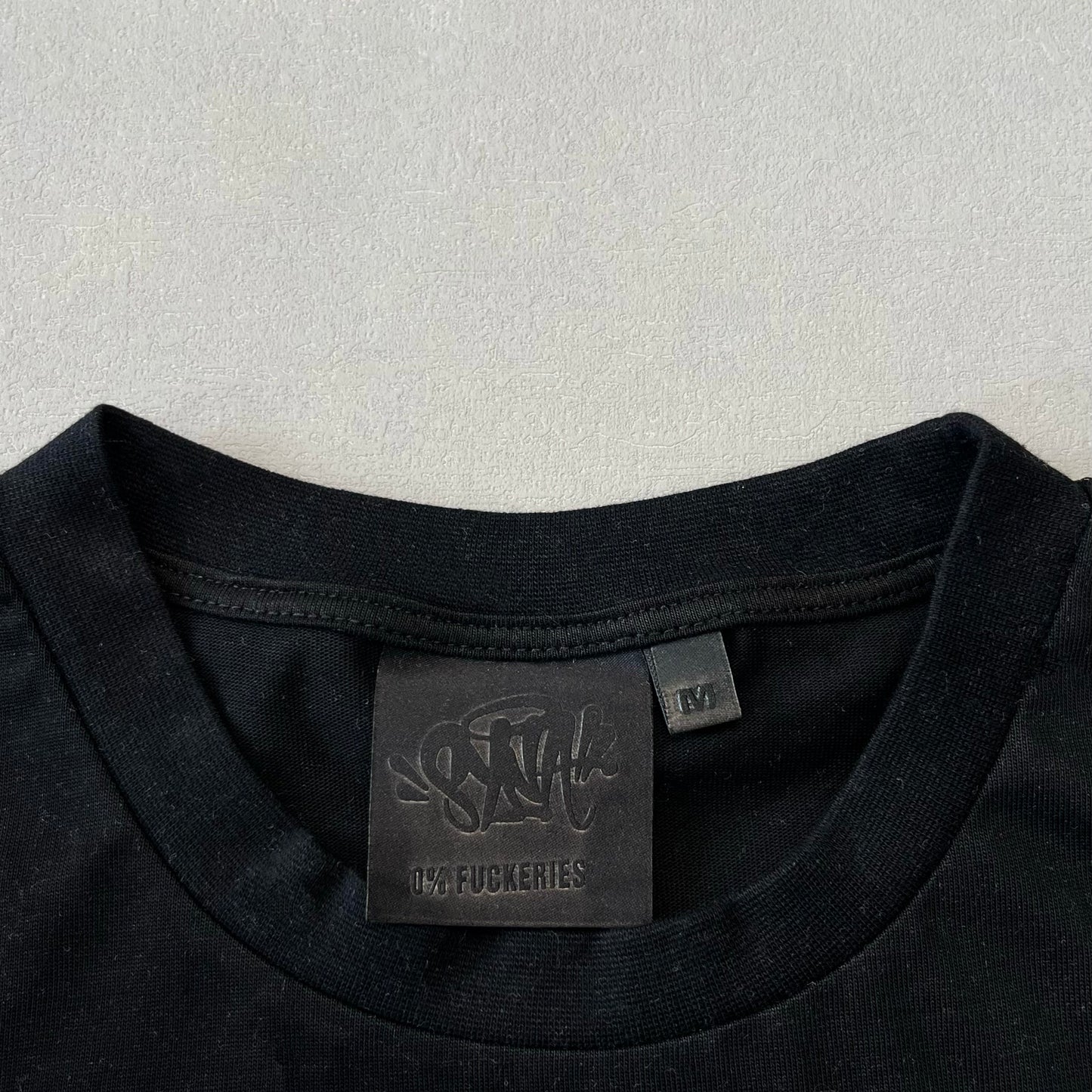 Syna World Tee