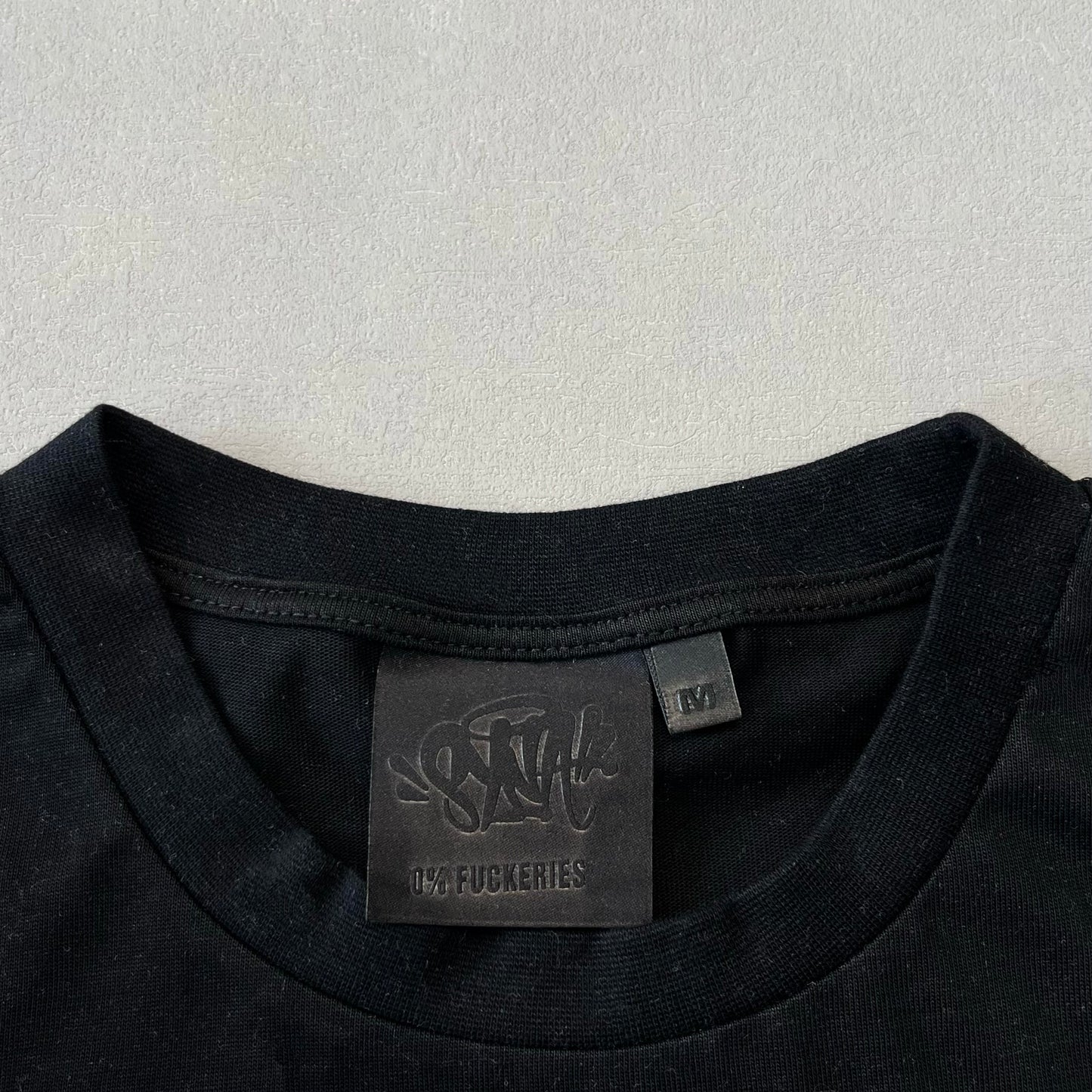 Syna World Tee