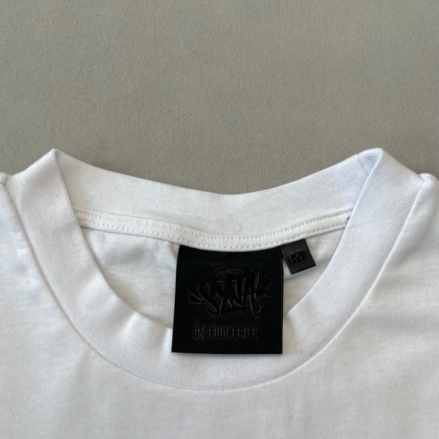 Syna World Tee