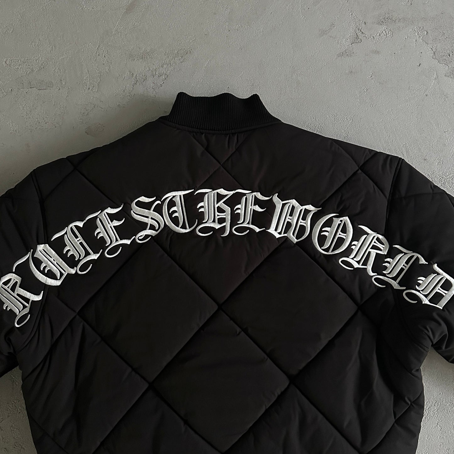 Corteiz Olde English Quilted Bomber Jacket