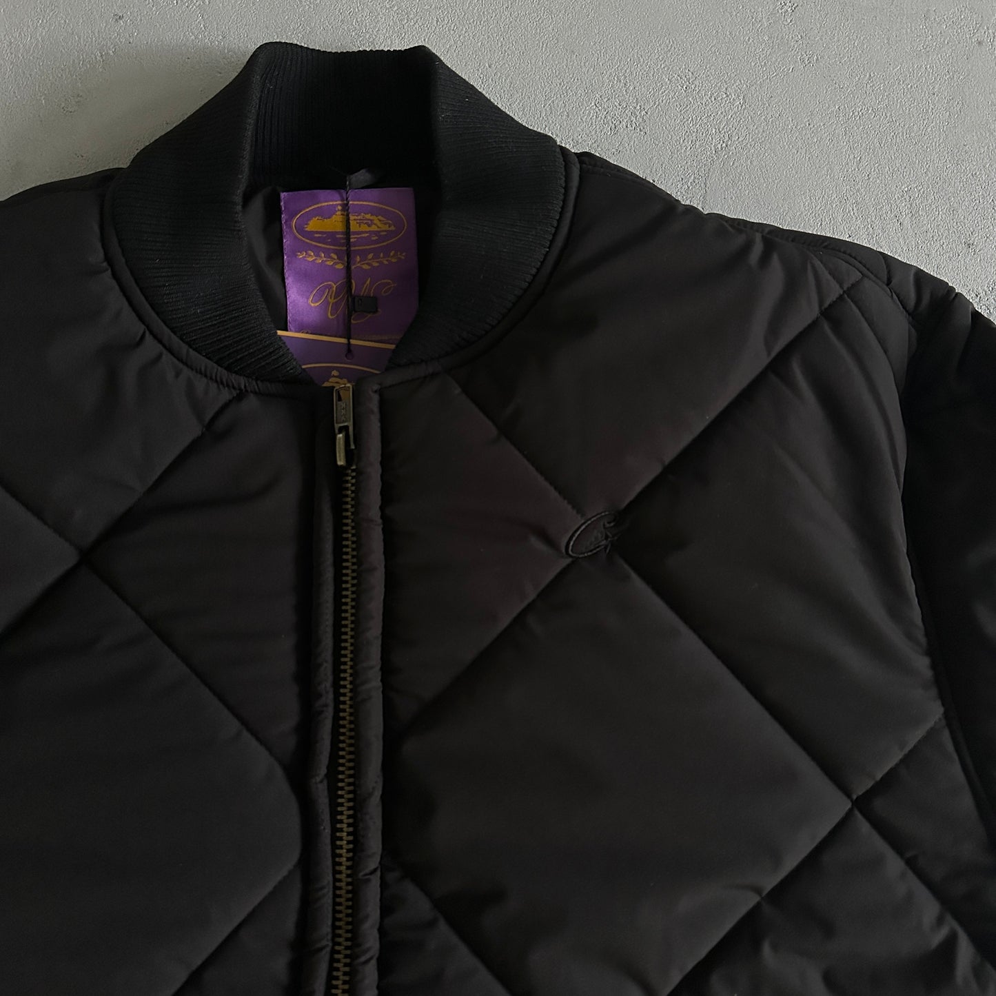 Corteiz Olde English Quilted Bomber Jacket