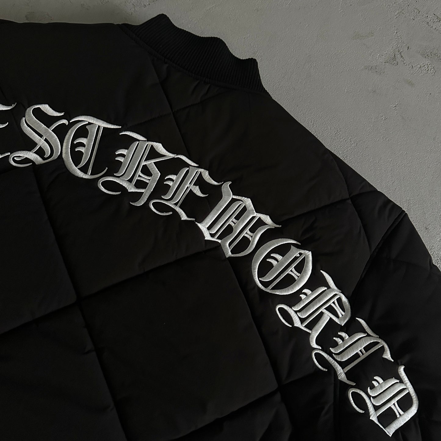 Corteiz Olde English Quilted Bomber Jacket