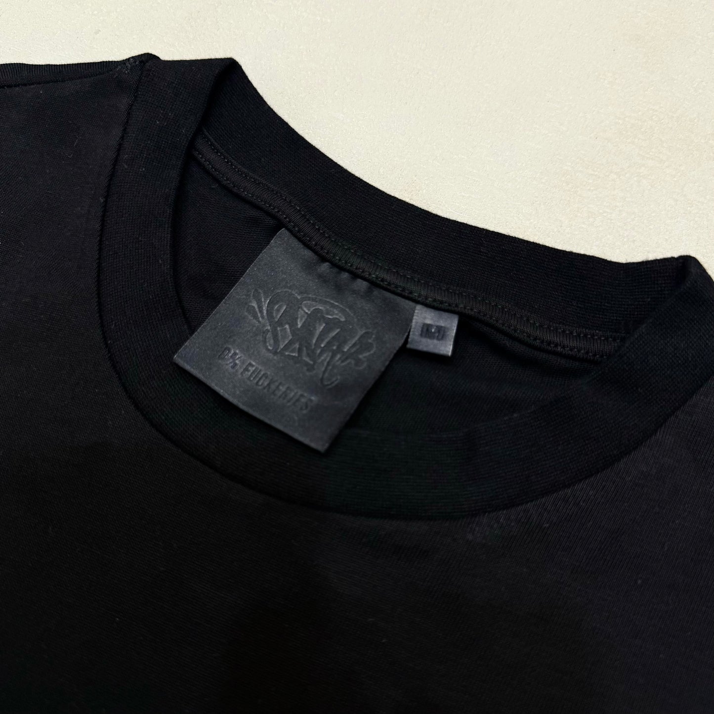 Syna World Tee